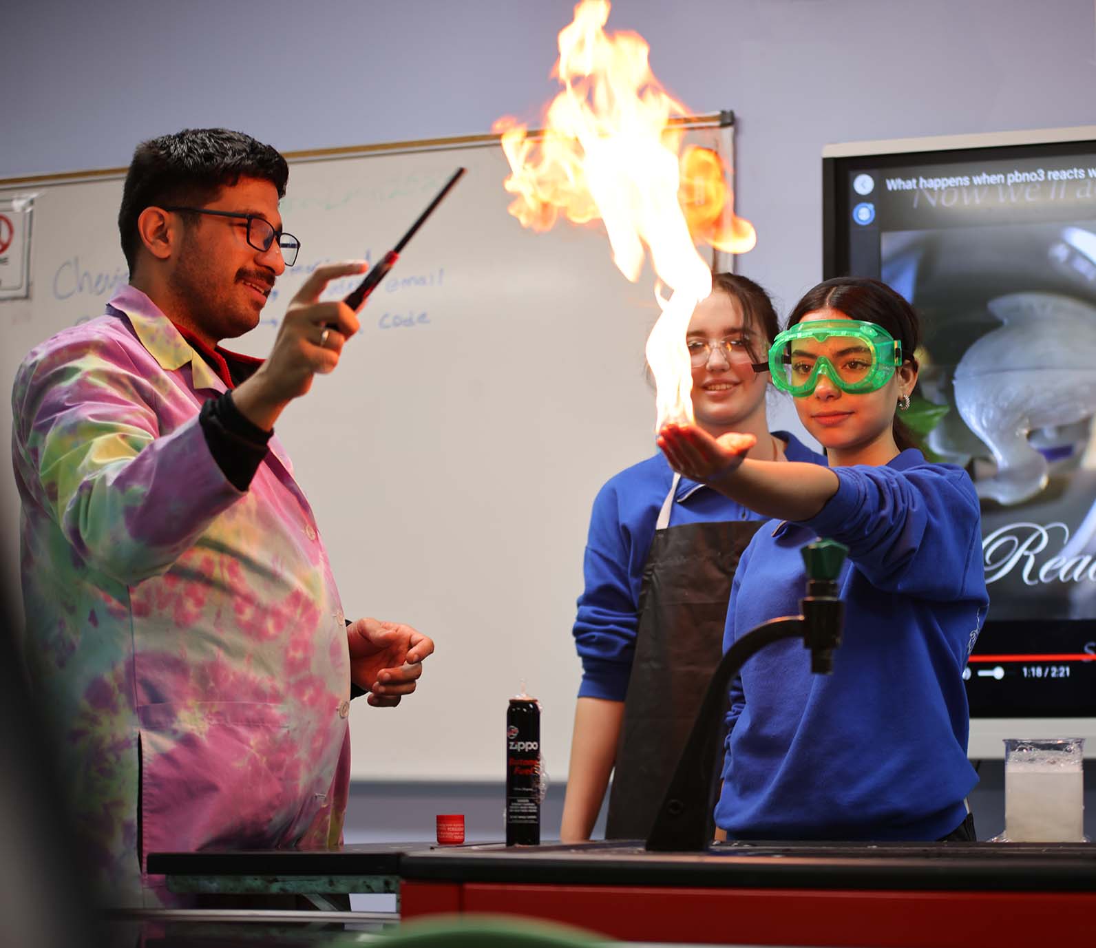 Gateway Science Academy of St. Louis High student wearing headphones uses a laptop in class